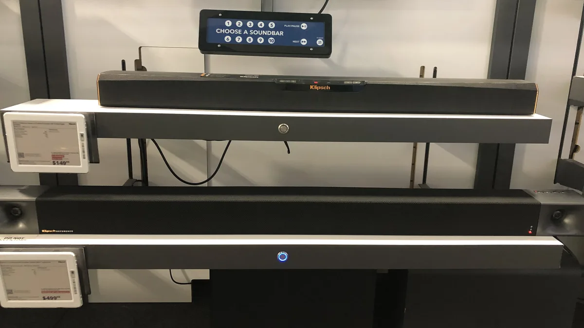 Photo by FASTILY, licensed under CC BY-SA 4.0 (Wikimedia Commons) Home theater soundbar and speaker setup connected to a TV, related to fixing IPTV audio and video sync issues