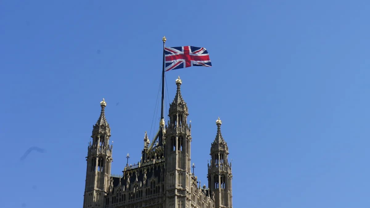 Photo by Rian (Ree) Saunders, licensed under CC BY 2.0 (Wikimedia Commons) The Union Jack flying above the Victoria Tower of the Houses of Parliament in Westminster, London
